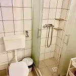 Quarto em Acomodações Particulares Goscinne Razem
